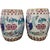 Striking pair of vintage Chinese porcelain garden stools richly decorated in a vibrant Famille Rose palette with lotus...