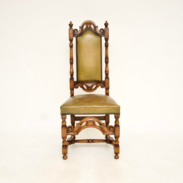 A beautiful antique leather and oak side / desk chair. This is in the gothic revival style, it was made in England and...