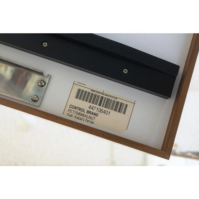 A George Nelson style swag leg desk. This is a very cool replica swag leg desk, inspired by very, very iconic mid-century...