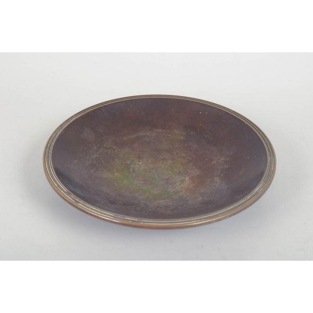 Just andersen, art deco bronze dish. Round dish in patinated bronze with softly curved forms and simple, rounded rims. The...