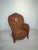 Royal/Club Wicker Armchair in Art Deco Style This Art Deco armchair is made of wicker. It features a high backrest with...