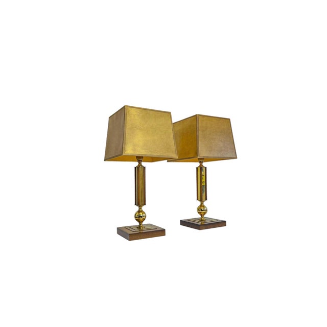 An exceptional and identical pair of stately table lamps from the renowned German-Swiss manufacturer Temde Leuchten. These...