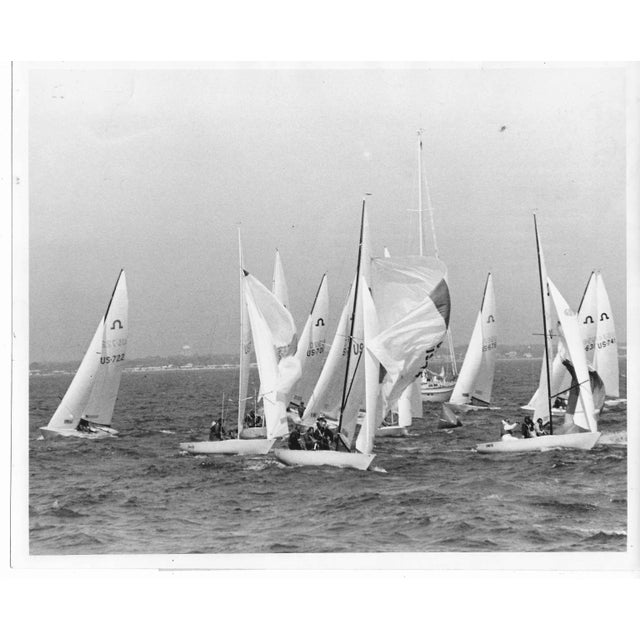 1984 black and white photo of a sailboat race on Tampa Bay. Publication information on the back.