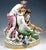 Very delicate meissen porcelain group of the late 19th century: three beautiful young women with artfully pinned-up hair...