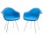 A pair of fiberglass arm shell chairs designed by Ray & Charles Eames and produced by Herman Miller in 1972. The white...