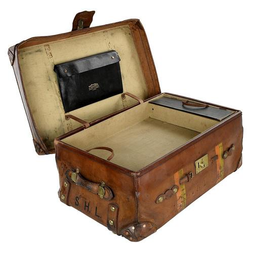 This English leather suitcase from the 1920s is a true gem of craftsmanship from the period. Designed by John Pound & Co....