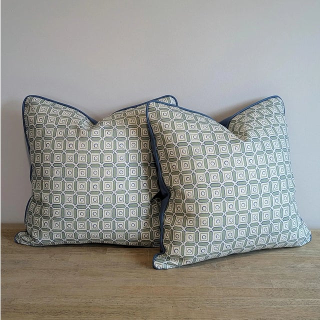 Marika Meyer San Michele print pillows with coordinating blue linen piping and backs. The print was inspired by the...
