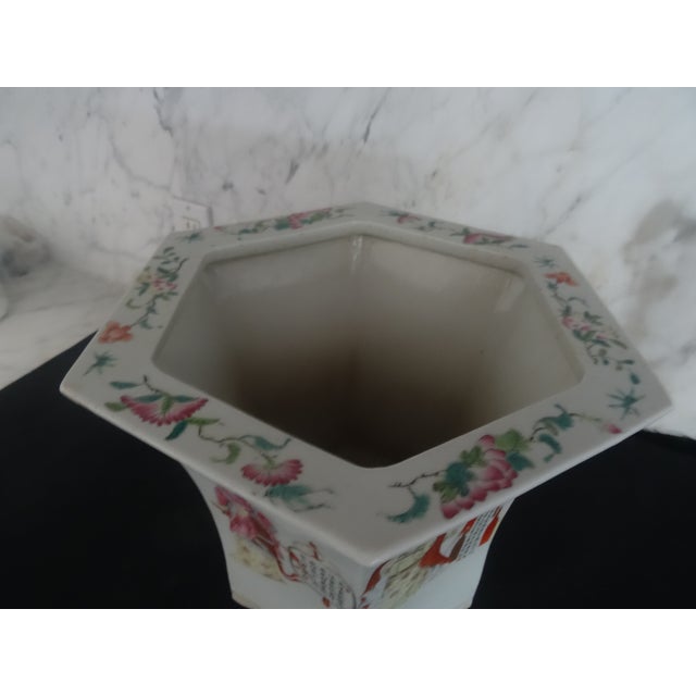 A very fine Jardiniere with well painted figures and Chinese calligraphy. Late 19th or early 20th century.