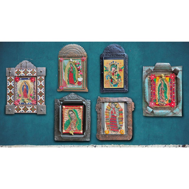 This vintage Mexican nicho shrine is a mixed-media devotional work assembled from metal, paper, and applied decorative...
