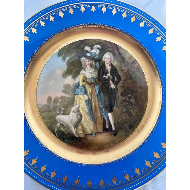 Stunning antique Royal Vienna style porcelain cabinet plate. Measuring a generous 10.5 inches in diameter, this exquisite...