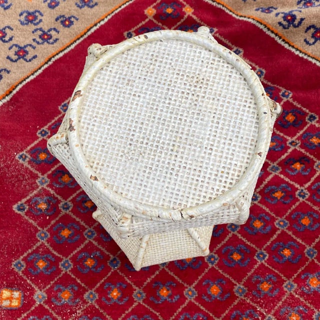 This extraordinary plant stand appears to be made of jute and cane and wood. Sadly it has been painted and even more sad...