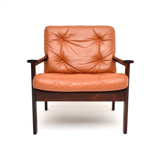 A stunning Danish leather Capella armchair by Illum Wikkelso. This was made in Denmark by Niels Eilersen in the 1960’s....