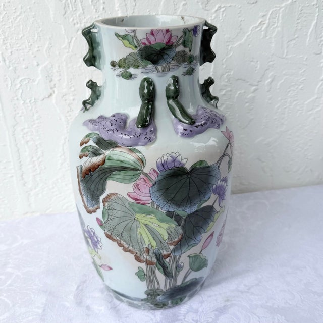 A beautifully crafted vintage Toyo Macau porcelain vase showcasing timeless Chinoiserie elegance. The classic baluster...
