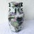 A beautifully crafted vintage Toyo Macau porcelain vase showcasing timeless Chinoiserie elegance. The classic baluster...