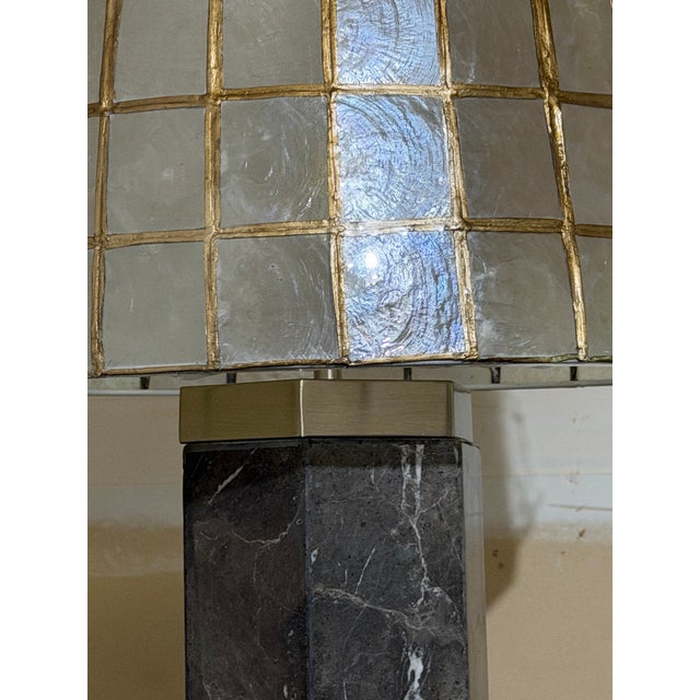 -“very cool,” epitomized in a light- A one-of-a-kind commissioned pair, featuring a refurbished lamp base from the late...