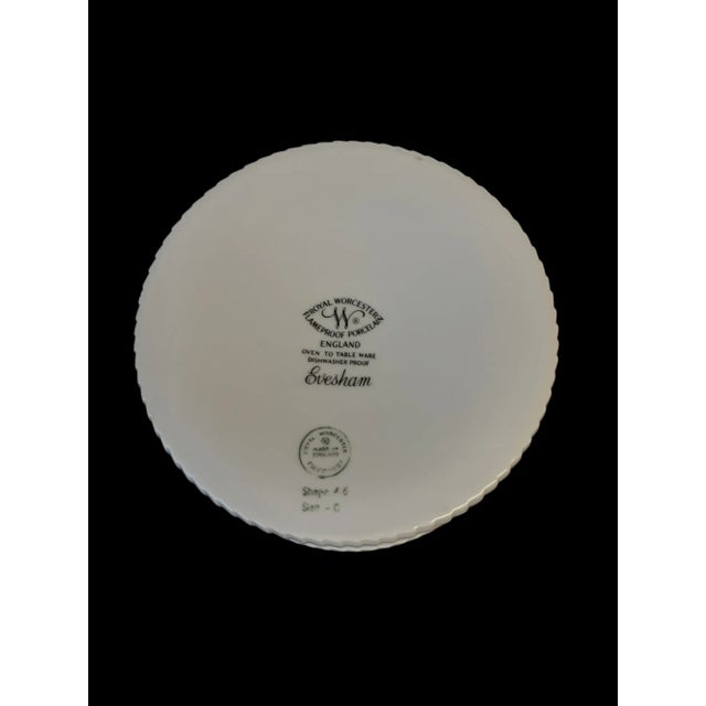 Eversham Royal Worchester Fluted Souffle Dish with various fruits painted on sides and a gold band at the top. Stamped...