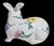 vintage 1996 Tiffany & Co ceramic rabbit figure features hand-painted flowers. Measures at 8 inches length and 6.75 inches...