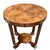 Elegant round Art Deco coffee table dating from the 1920s–1930s. The piece stands out for its clean geometric lines,...