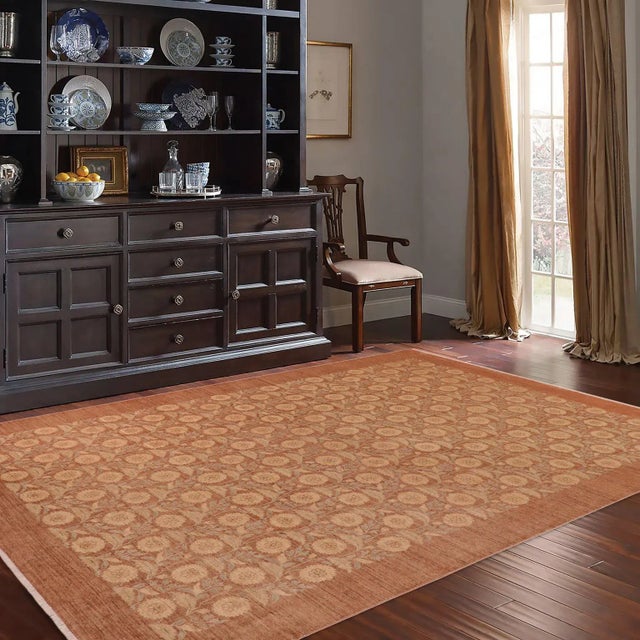 "Enhance the ambiance of your home with this magnificent Persian-influenced Turkish hand-knotted rug made by skilled...