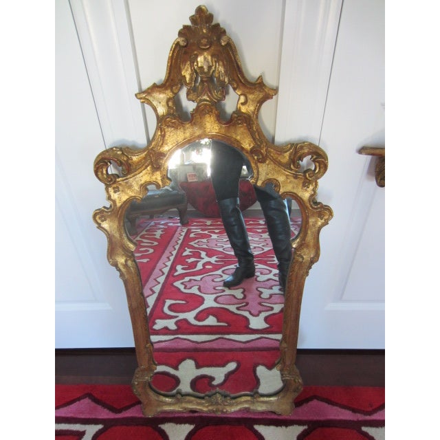 Gilded Italian mirror with shelf. A beautiful piece that will add to your décor!