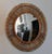 The ‘Oculus’ round rattan convex mirror. Convex mirror inserted into a round rattan frame.