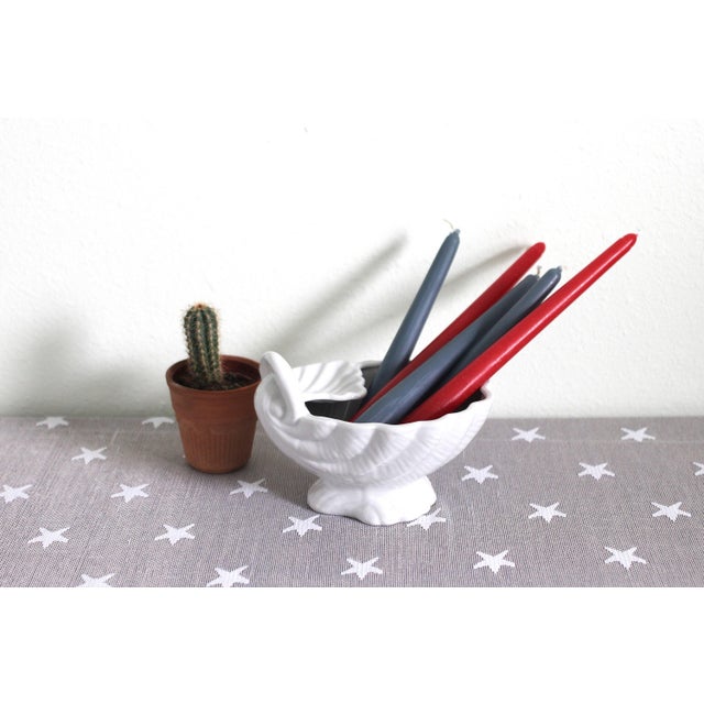 White ceramic shell bowl with 2 places for storage. Would make a great soap organizer or jewelry dish. The larger bowl...
