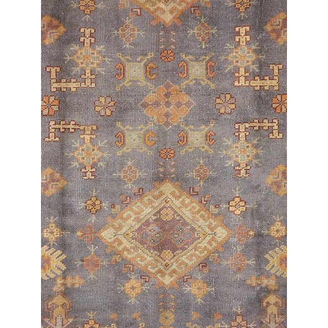 A vintage Turkish Oushak carpet from the second quarter of the 20th century. Measures: 7' 1" x 8' 7"