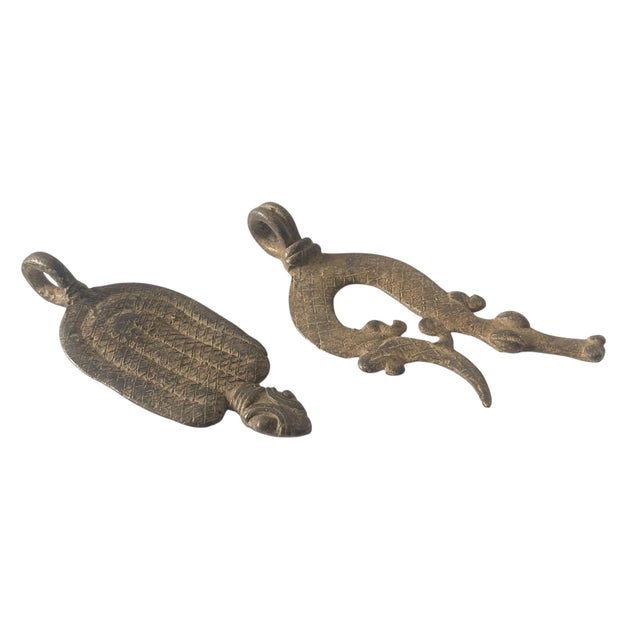 A remarkable example of Gan bronze from Burkina Faso, using the refined lost-wax casting method with set of a crocodile...