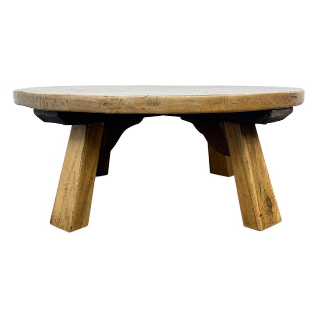 Beautiful rustic solid oak coffee table featuring a thick round top and sturdy angular legs. Crafted from heavy oak with a...