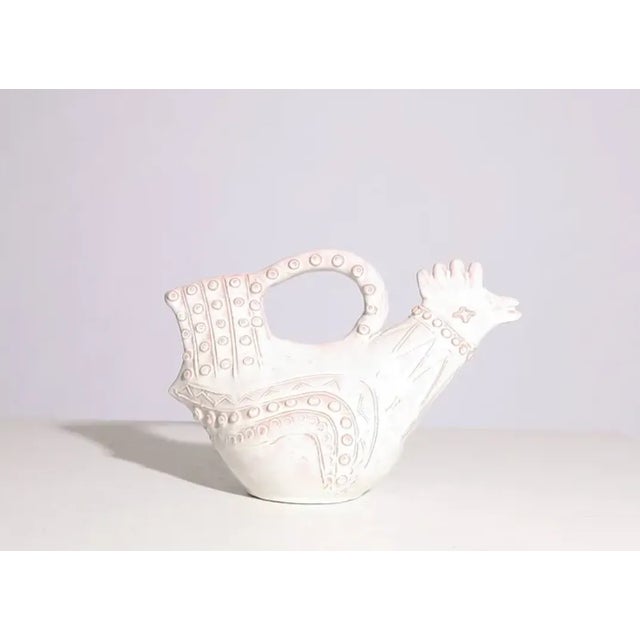 A beautiful example of French Mid Century Master André Baud's Ceramic sculpture of a rooster/ bird from 1950. .