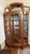 Large Victorian Oak Curved Front Curio c. 1890-1920. This Large Ornate Golden Tiger Oak Curio has three glass bows with...
