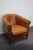 This cognac-colored leather club chair comes from the Netherlands. It is upholstered with cognac-colored leather and...