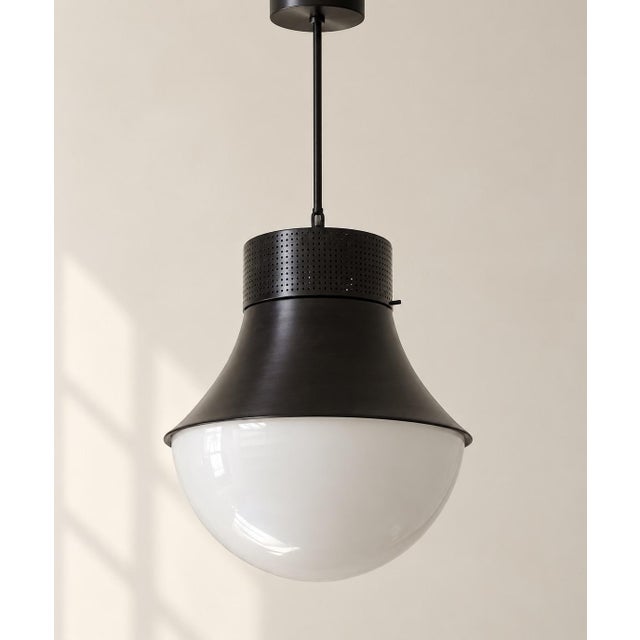 Gorgeous pair of Precision Large Pendants for Visual Comfort. Featuring sculptural geometric metalwork in a rich bronze...
