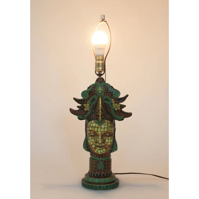 Colorful hand painted vintage figural tribal plaster table lamp. Wired and in working condition. Uses standard 60 watt...