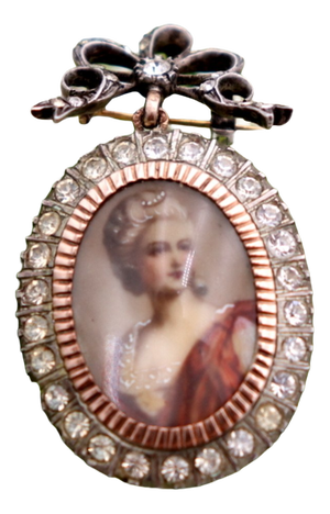 Gold and Silver Bow-Shaped Brooch