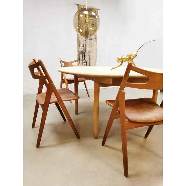 Rare find! these beautiful original danish dining chairs were designed by the well known hans j wegner. Produced by carl...