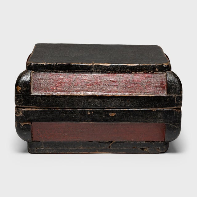 This simple lacquered container was once used as a 19th-century snack box, presented as a gift during holidays and special...