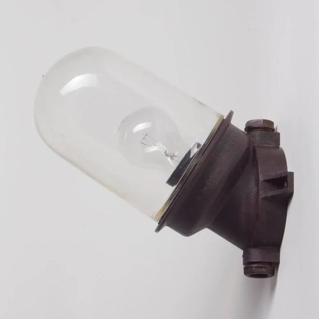 This is a great industrial wall light from the 1950s. The light was originally used in the factory. The glass is very...