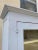 Wood 1900s Antique Country Farmhouse White Painted 2 Piece Step Back Hutch Kitchen Cupboard For Sale - Image 7 of 12