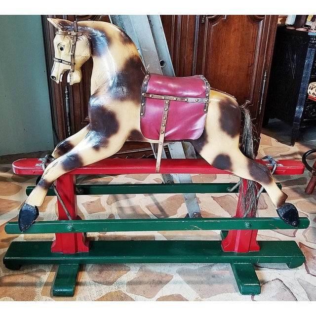 Every child's dream toy, a lovingly restored 19c American carved wood hobby horse swinging on it's own platform. Older...