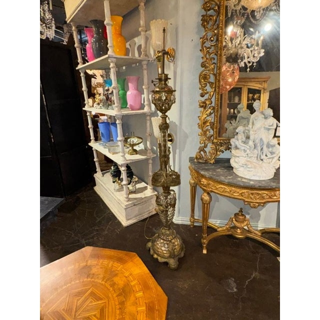 This rare 19th c. French Bell Epoch gilt bronze floor lamp is a stunning piece of home decor that exudes elegance and...