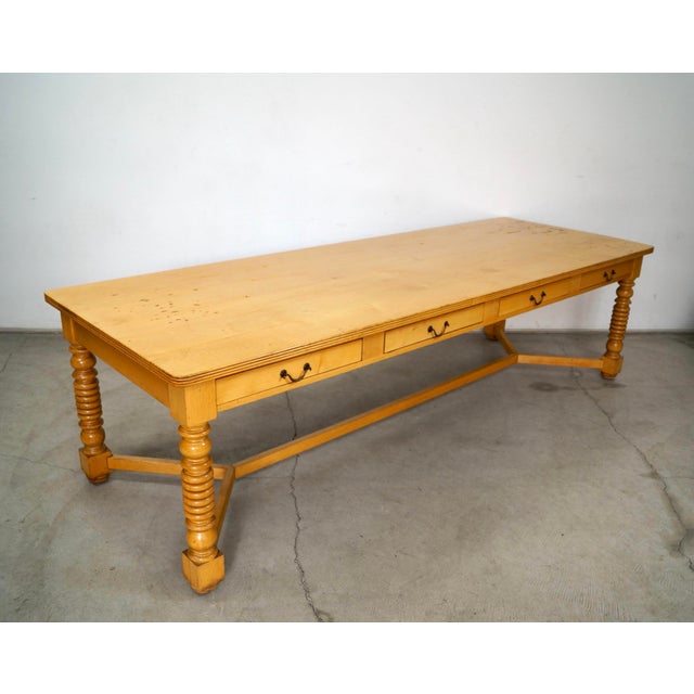 Vintage 1970's long farm table for sale. It's made of solid maple, and has a nice natural light wood finish. It's a super...