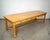 Vintage 1970's long farm table for sale. It's made of solid maple, and has a nice natural light wood finish. It's a super...