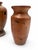 Pair of mid-century hand-turned studio wood vases signed HP on the bases. Each is made from richly figured exotic wood...