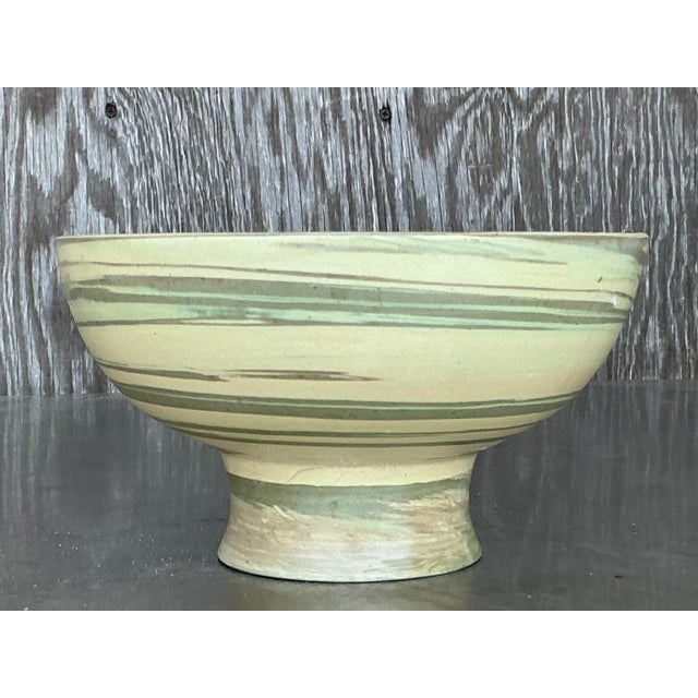 Bring a touch of artisanal charm to your space with this vintage boho studio pottery bowl. Handcrafted with a beautiful...