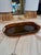 Elegant mid-century Italian serving tray featuring a richly patterned tortoiseshell-effect finish in warm amber and dark...