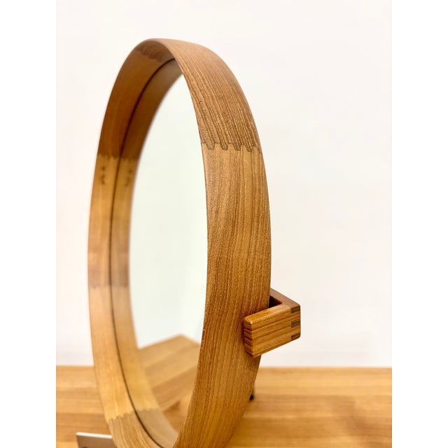Rare teak table mirror model 517 designed by Uno & Östen Kristiansson for the Swedish company Luxus. Frame in solid teak...