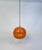This high-quality colored opaline glass hanging lamp was manufactured by peill & putzler in germany during the late 1960s...
