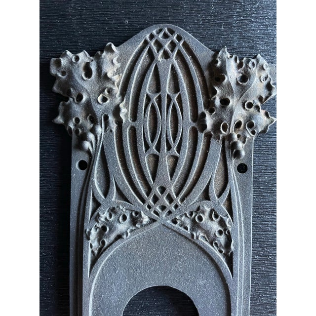 A pair of important escutcheons designed by Louis Sullivan. Matching and original historically important ornamental cast...