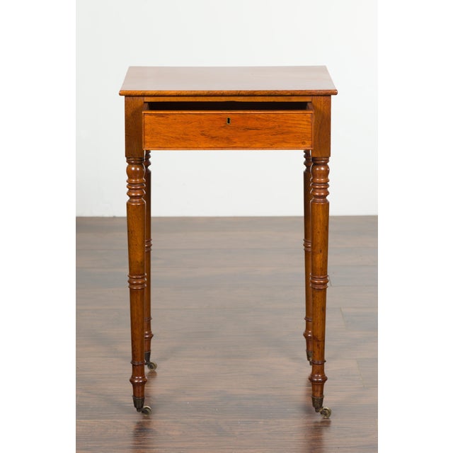 English 1820s Walnut Side Table with Single Drawer, Turned Legs and Casters For Sale - Image 12 of 12
